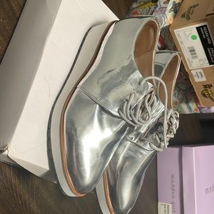 Brand new ALDO  silver platform shoe !! Never worn